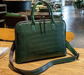 Women’s genuine leather laptop briefcase with zipper closure and animal print design
