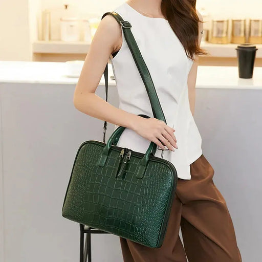 Women’s genuine leather laptop briefcase with zipper closure and animal print design