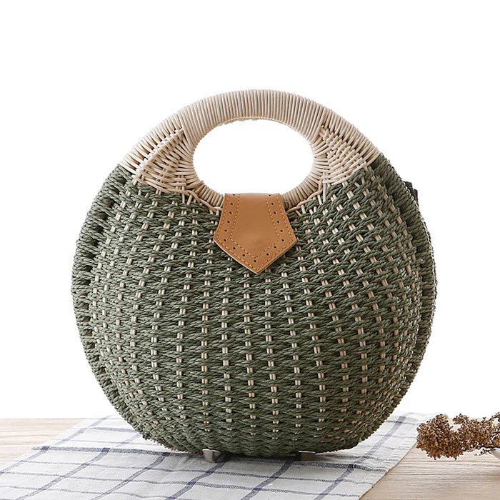 Women's natural rattan handwoven round shell tote bag with hollow out weave detail polyester lining exterior slit pocket single top handle in multiple colors for beach travel shopping and casual use