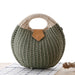 Women's natural rattan handwoven round shell tote bag with hollow out weave detail polyester lining exterior slit pocket single top handle in multiple colors for beach travel shopping and casual use
