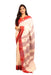 Elegant Kotpad saree handwoven in Odisha with natural Aul tree dyes, tribal motifs, and matching blouse piece