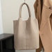 Shucai genuine leather women’s bucket bag in solid color with interior zipper pocket and two handles, soft and versatile for all-season use