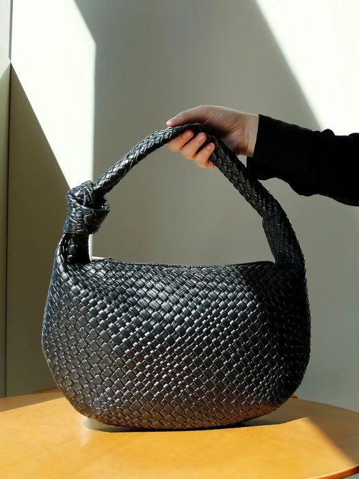 Women’s PU leather fashion box bag with structured box shape and synthetic leather lining