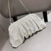 Shiny metallic women's clutch bag with polyester lining