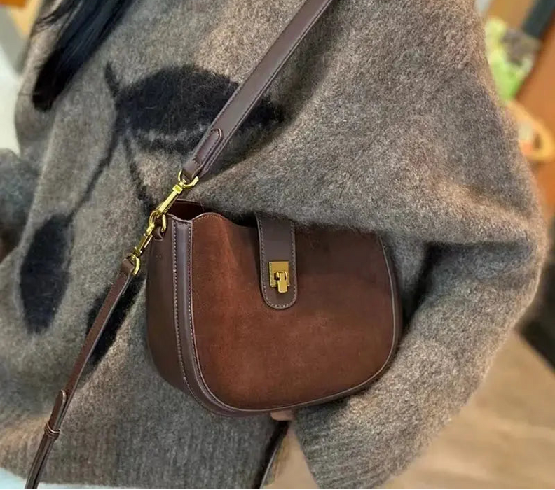 Soft cow leather half moon women's crossbody bag with zipper hasp, phone pocket.