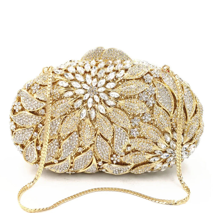 Women’s beaded minaudière clutch with chains, rivets, and sequined decoration
