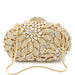 Women’s beaded minaudière clutch with chains, rivets, and sequined decoration
