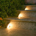 Solar powered LED deck lights with 24 LEDs installed on outdoor stairs and pathways