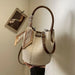 Women’s PU leather bucket handbag with zipper closure, knitting pattern, and dual straps for casual or business use.
