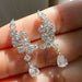 Pear Cut Moissanite Drop Earrings – D Color VVS1 Elegance SF