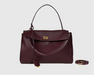 Soft cow leather women's tote bag with buckle, silt pocket, crossbody straps