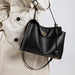 Women’s casual leather satchel handbag with secure hasp closure and organized interior