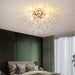 Modern 4-light crystal dandelion starburst ceiling chandelier in chrome finish with clear crystal pearl beads for living room and dining room lighting