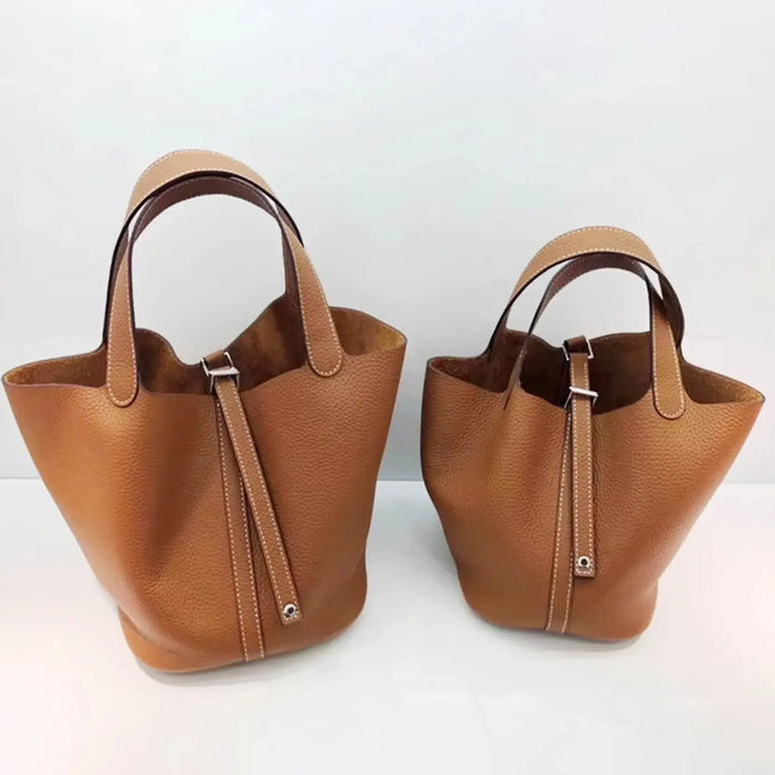 Soft cowhide leather unisex bucket bag with open top, lock, scarves