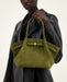 PU leather dumpling bun handbag for women, casual tote and crossbody bag with hasp closure and cell phone pocket