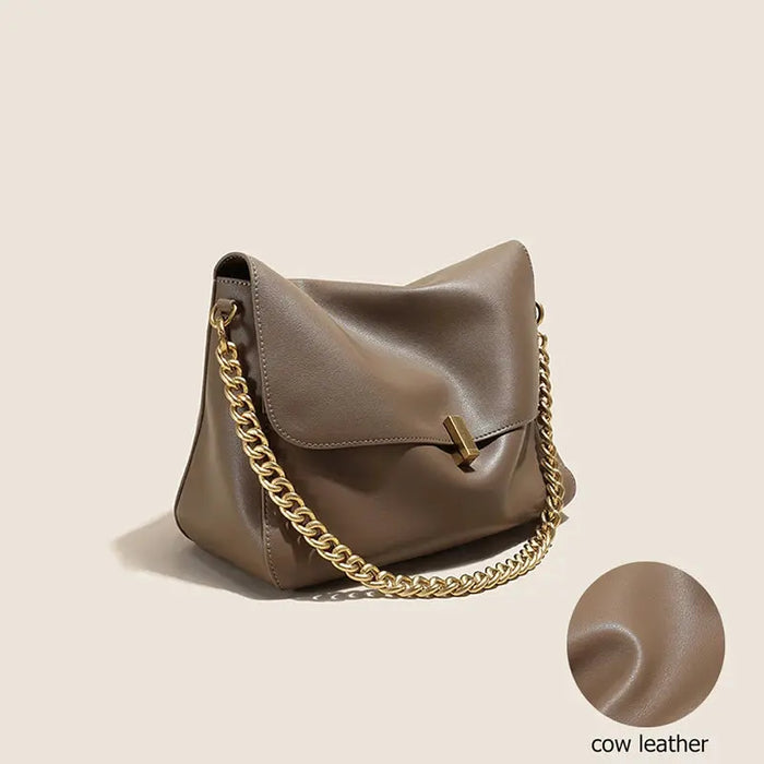 Women’s casual cow leather shoulder bag with flap design and zipper closure
