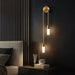 Modern black and gold LED wall sconce with up and down light direction and frosted acrylic shade for bedroom and bathroom lighting