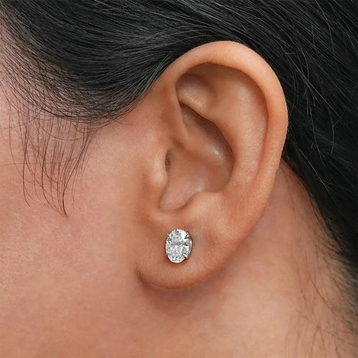 Oval cut D color VVS1 moissanite stud earrings in 925 sterling silver