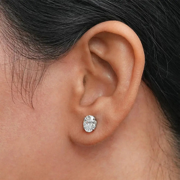 Oval cut D color VVS1 moissanite stud earrings in 925 sterling silver