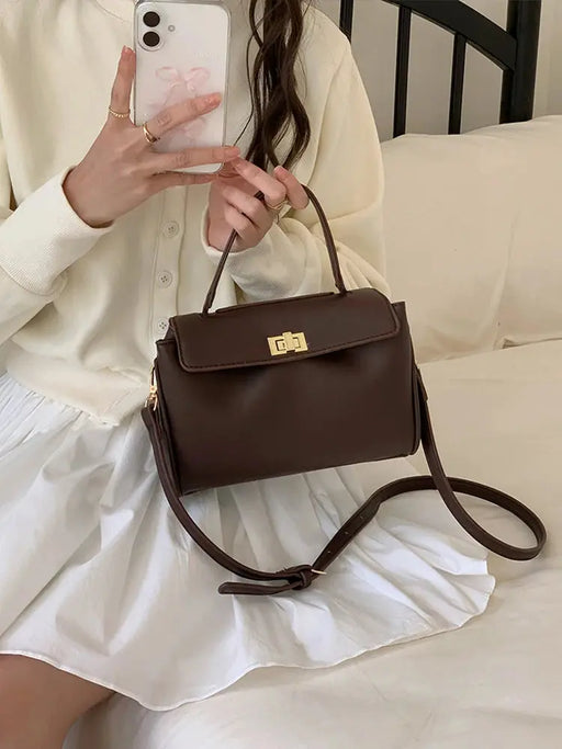 Lightweight PU leather women's box bag with twist lock, structured shape