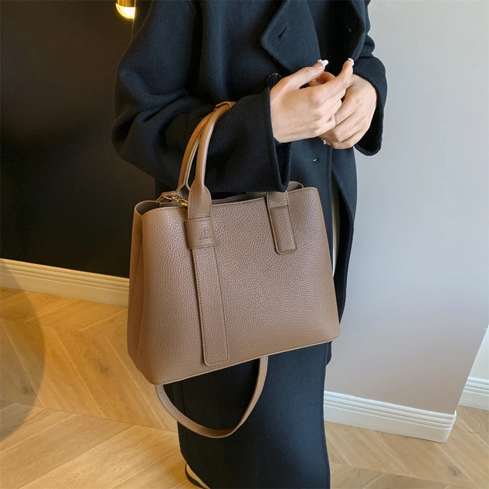 Women’s PU leather saffiano business handbag with adjustable strap and multiple compartments
