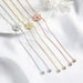 D color round-cut moissanite necklace in 925 sterling silver with white gold plating

