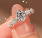 Platinum-plated moissanite ring with a bright stone-set design for women.