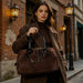 Women's genuine cowhide leather large capacity tote bag with suede velvet finish zipper closure multi pocket interior cotton lining single shoulder strap for commuting work travel and everyday luxury use
