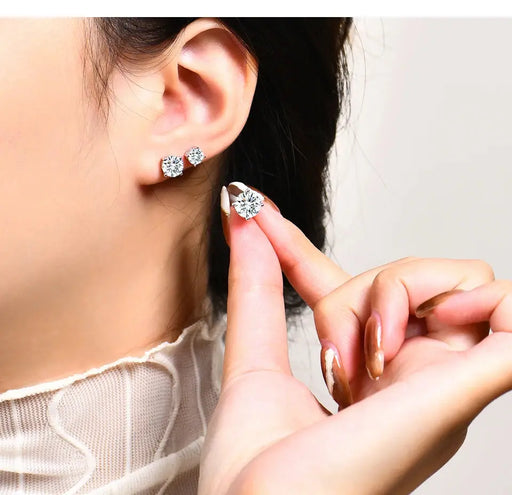 D-color VVS1 round moissanite stud earrings in 925 sterling silver