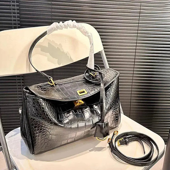 Unisex daily crossbody bag with crocodile texture, lock buckle, and double straps