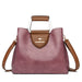 Casual tote handbag made from microfiber synthetic leather with zipper closure and multiple storage compartments.