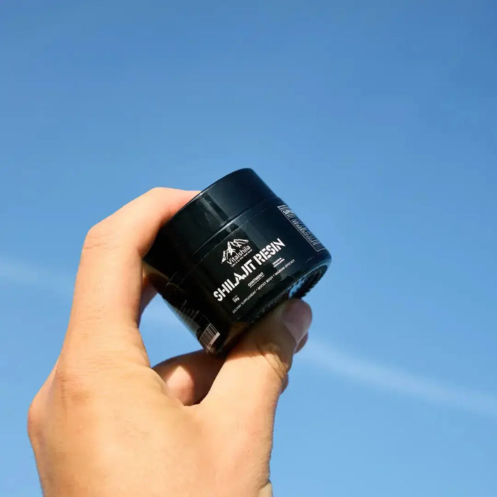 Glass jar of pure Himalayan Shilajit resin with fulvic acid for stress relief and mental clarity

