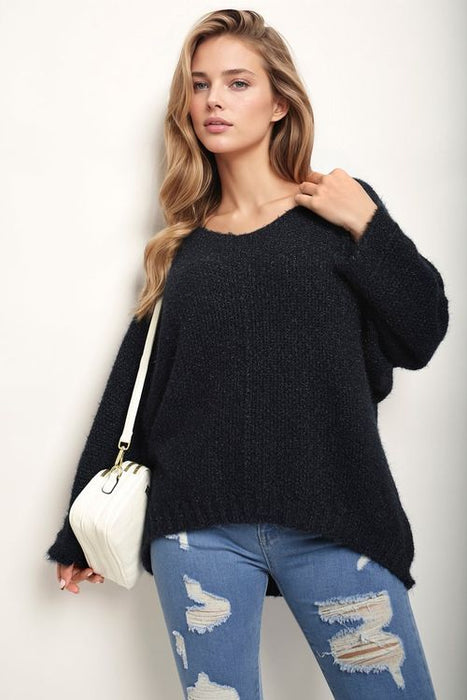 V-neck chunky knitted jumper with oversized fit and cable knit texture – cosy autumn winter sweater for women UK
