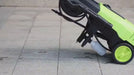 1800W high-pressure jet washer with adjustable nozzle, spray gun, hose, and cleaning accessories
