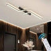 Modern LED line ceiling lamp with sleek strip design illuminating a stylish indoor space