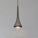 Modern aluminum pendant light hanging over a stylish dining space