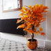 Artificial maple tree with vibrant orange leaves and gnarled wooden stem, 125cm tall

