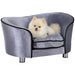 Orthopedic pet sofa for small dogs and cats with washable cover and storage pocket.