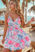 Floral mini dress with spaghetti straps, surplice neckline, and shirred waist, offering a stylish and flattering fit
