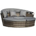 4-piece outdoor rattan daybed set with canopy and cushions on a garden patio

