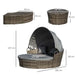 4-piece outdoor rattan daybed set with canopy and cushions on a garden patio

